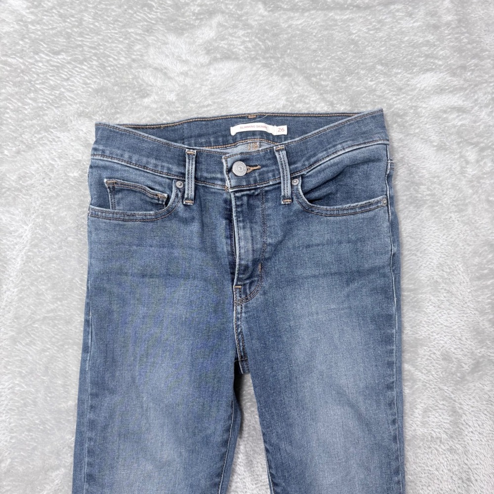 Levi's Slimming Skinny Jeans Women 26 Blue Raw Hem Medium Wash Stretch